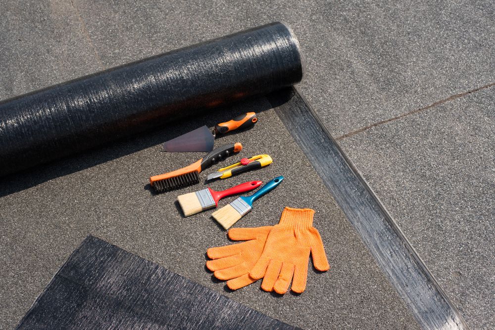 Roll roofing tools