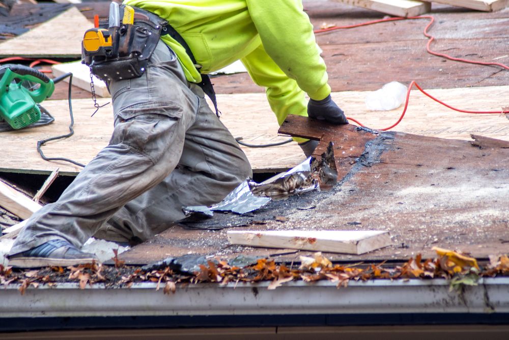roofer removing old roof