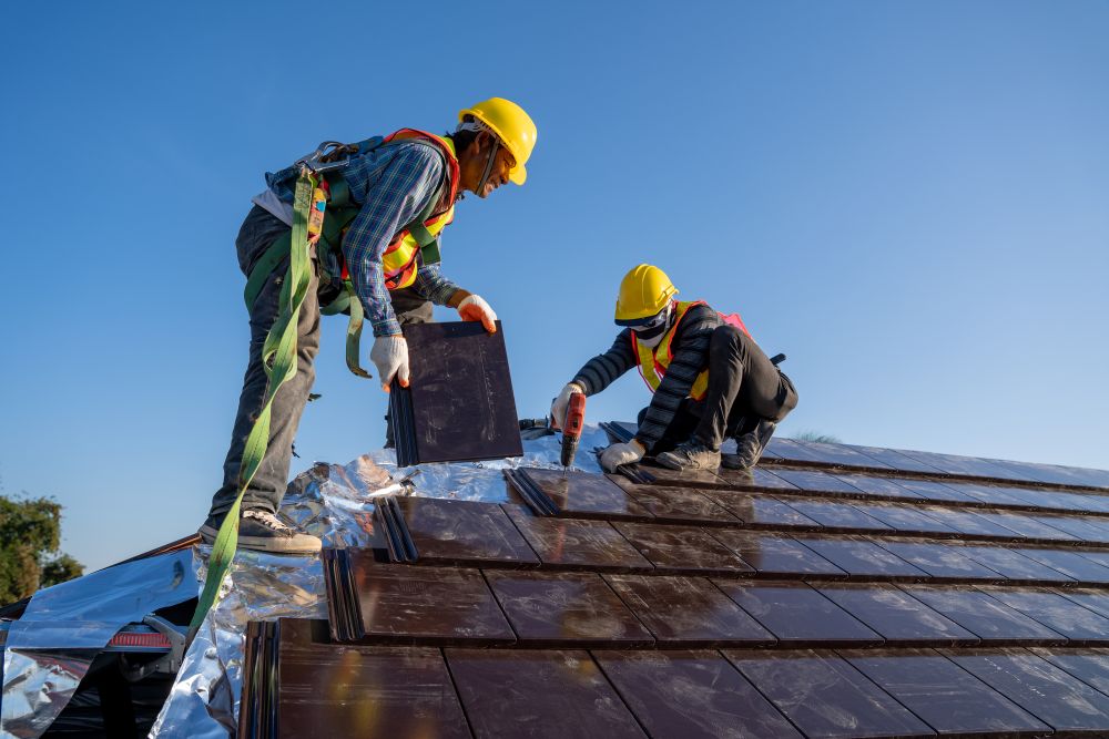 roofers installing tile roof