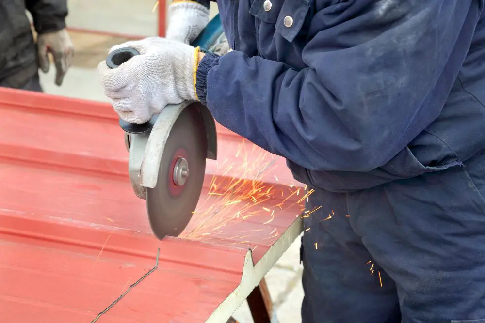 cutting orange metal roof using grinder