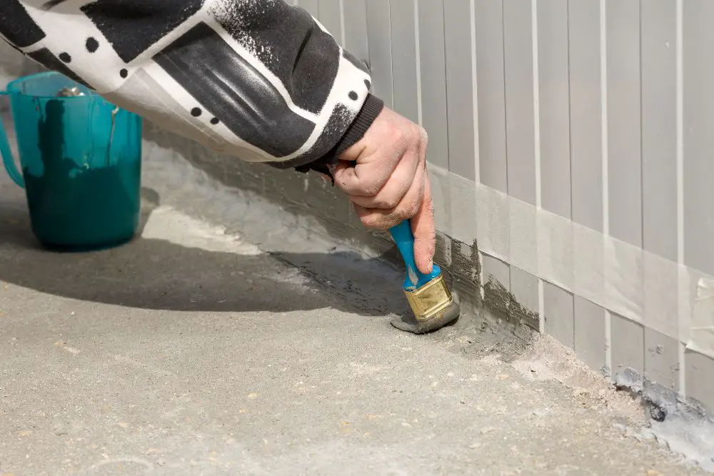 applying sealant on concrete