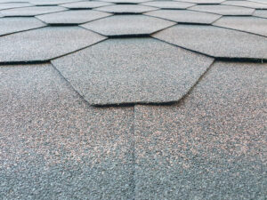 Bottom view of a roof with synthetic shingles folded in an hexagonal pattern