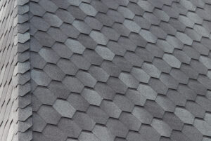 Close Up View On Asphalt Roofing Shingles Background.